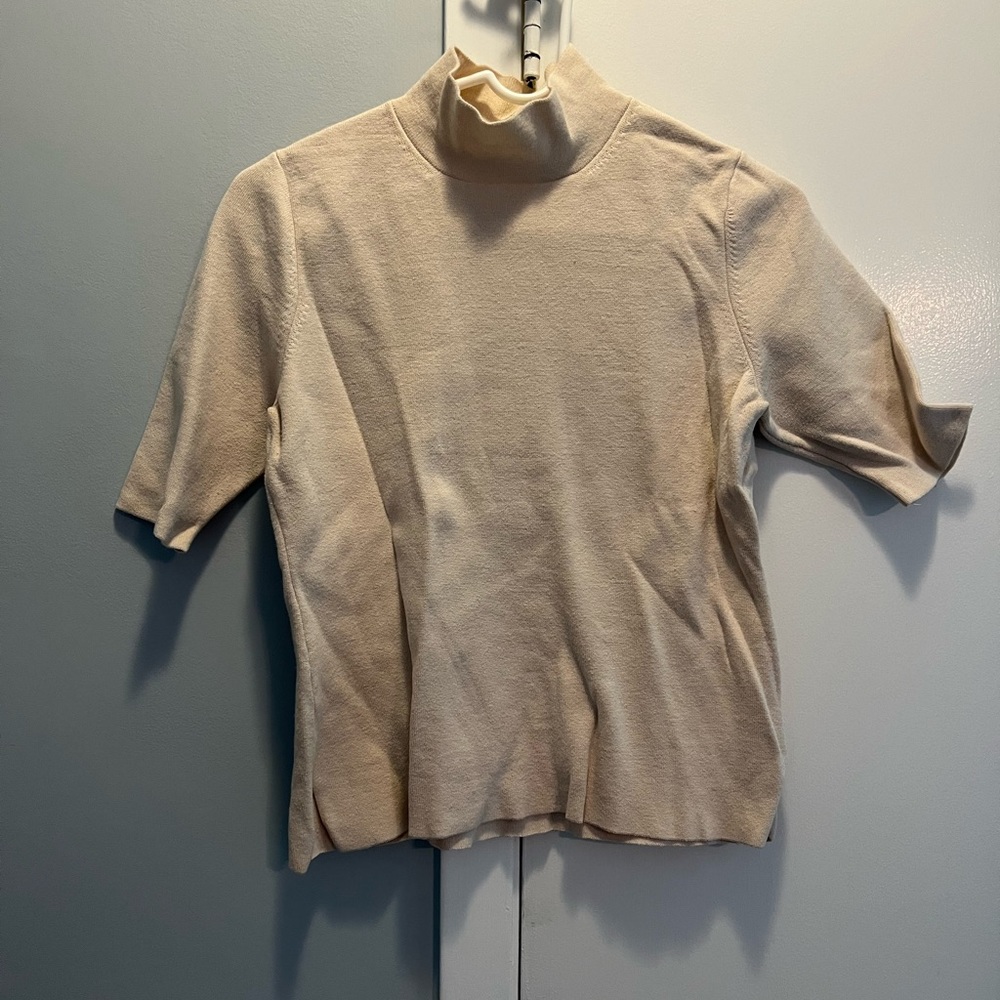 Off white turtleneck knit top